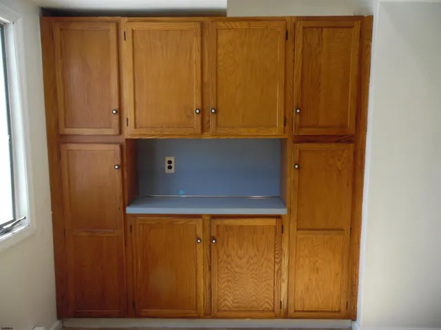 a view of hallway with a window