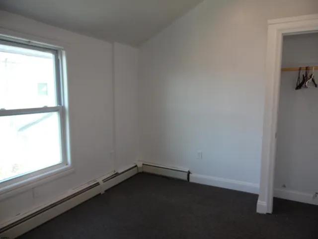 a view of balcony with furniture