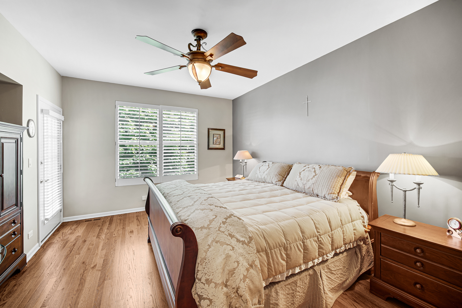 726 St Johns Place Addison, IL 60101 - Photo 15 of 39 a bedroom with a bed and a chandelier