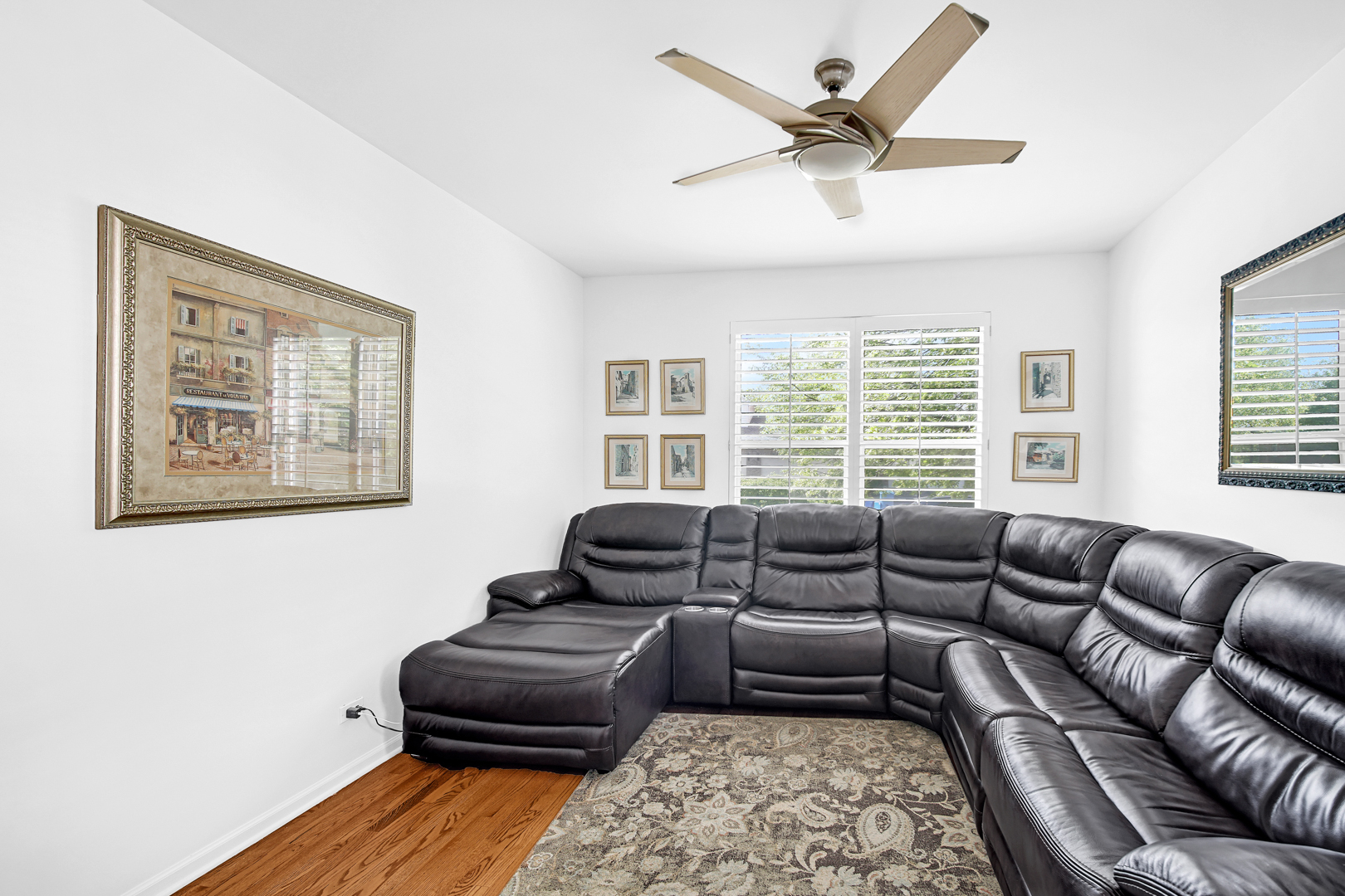 726 St Johns Place Addison, IL 60101 - Photo 20 of 39 a living room with furniture and a large window