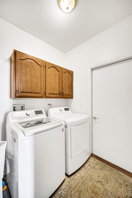 726 St Johns Place Addison, IL 60101 - Photo 23 of 39 a utility room with dryer and washer