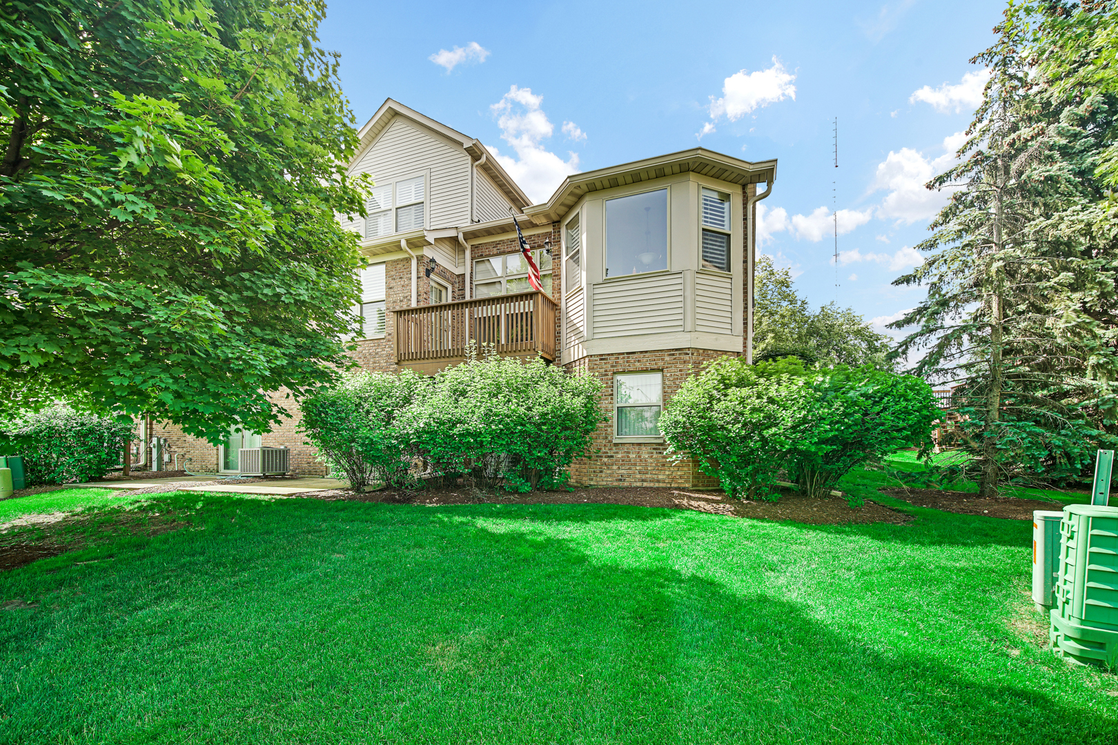726 St Johns Place Addison, IL 60101 - Photo 33 of 39 a front view of a house with a yard and trees