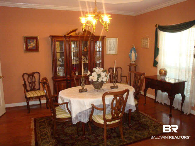108 Lakeridge Drive Fairhope, AL 36532 - Photo 10 of 17 FORMAL DINING WITH HARD WOOD FLOORS OFF OF FOYER.