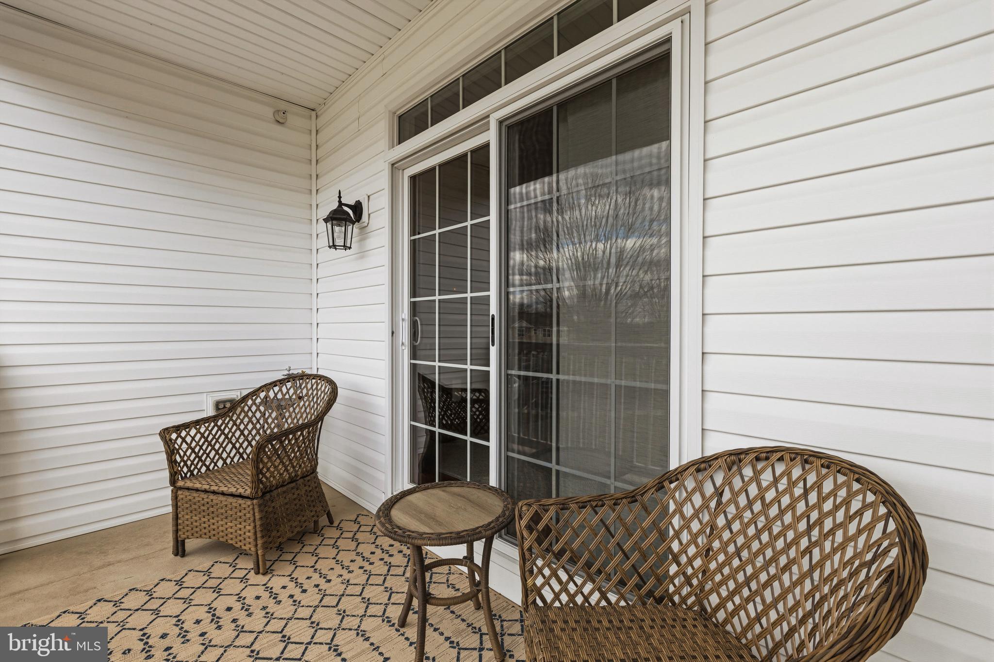 5217 Poplar Street Garnet Valley, PA 19060 - Photo 13 of 32 a view of a chair and table in the balcony