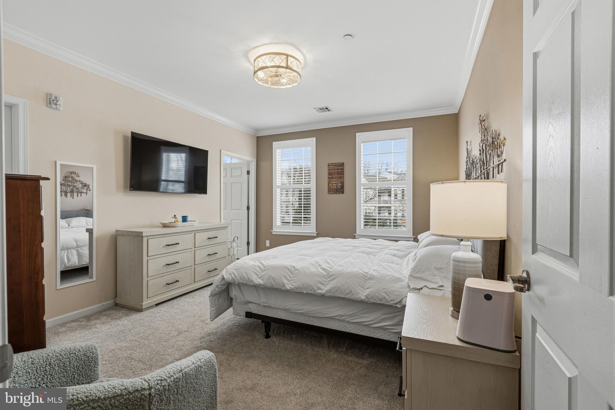 5217 Poplar Street Garnet Valley, PA 19060 - Photo 25 of 32 a bedroom with a bed and furniture