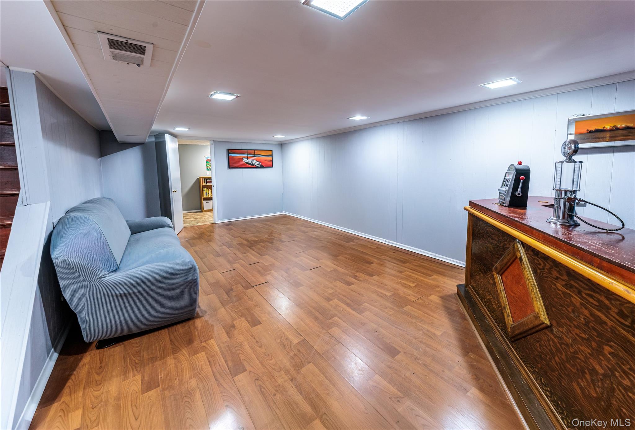 678 Front Street, Unit E Hempstead, NY 11550 - Photo 10 of 22 a workspace with furniture and window