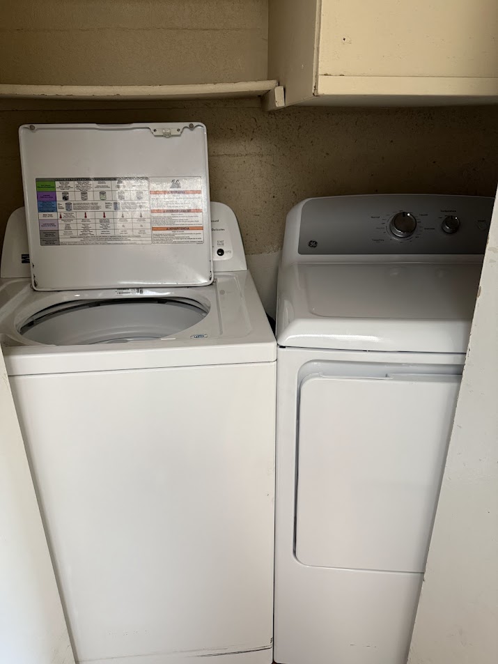 806 West 24th Street, Unit 223 Austin, TX 78705 - Photo 16 of 16 Laundry room with washer and dryer and laundry area