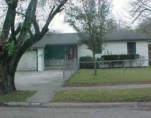 a view of backyard with green space