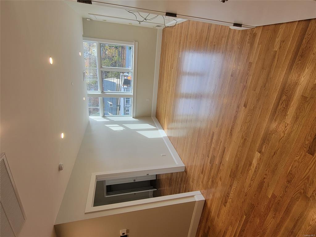 731 Broadway, Unit 3 Valhalla, NY 10595 - Photo 2 of 14 Unfurnished room with light hardwood / wood-style flooring
