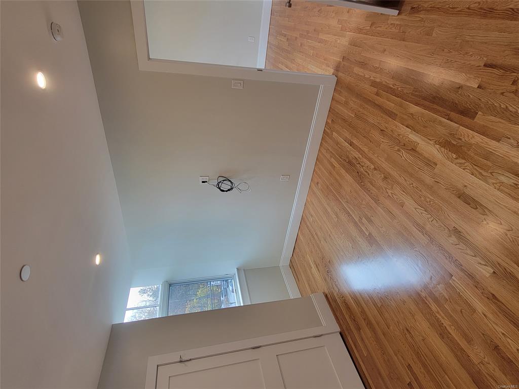 731 Broadway, Unit 3 Valhalla, NY 10595 - Photo 4 of 14 Empty room featuring light wood-type flooring
