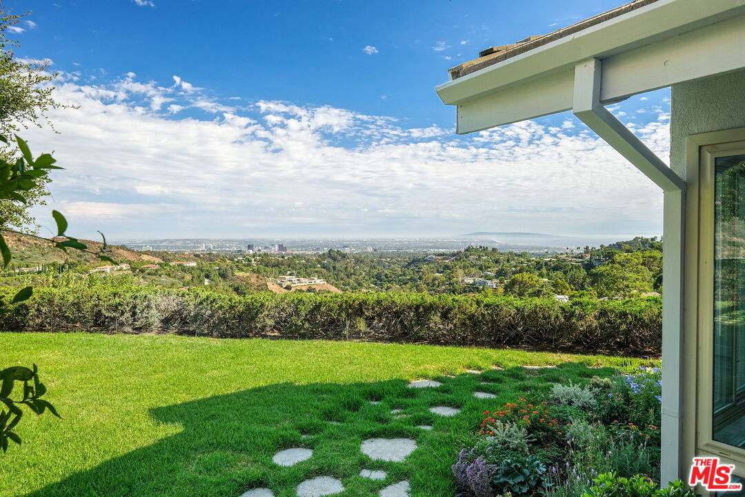 2526 Cordelia Road Los Angeles, CA 90049 - Photo 12 of 35 a view of a pathway both side of yard