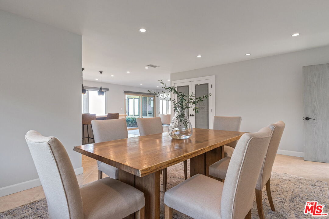 2526 Cordelia Road Los Angeles, CA 90049 - Photo 24 of 35 a view of a dining room and livingroom