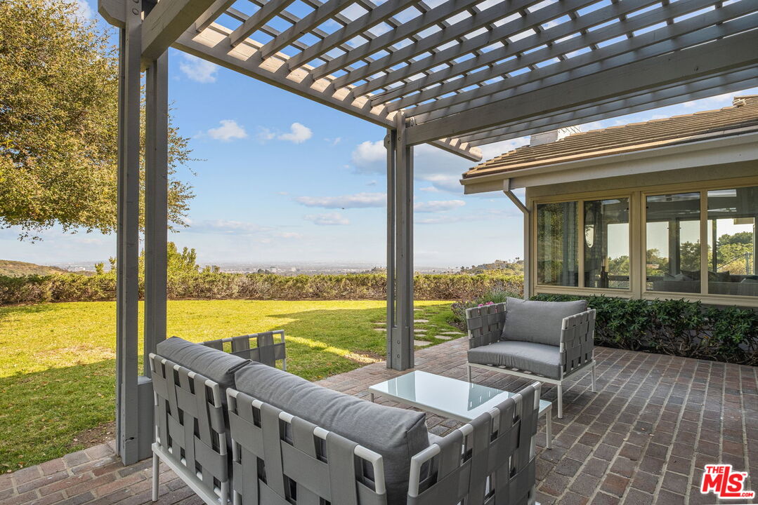 2526 Cordelia Road Los Angeles, CA 90049 - Photo 34 of 35 a view of balcony with patio