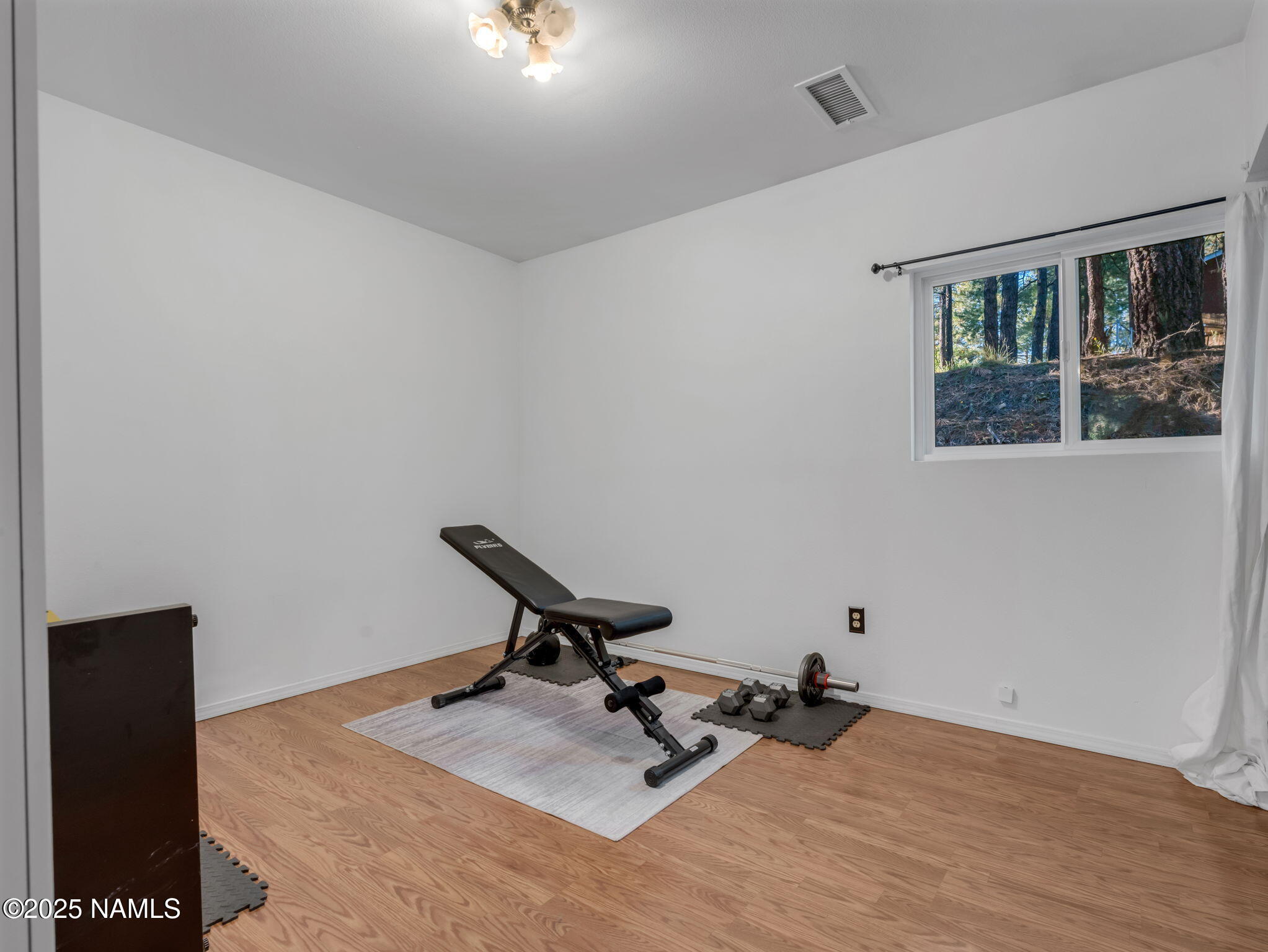 4449 Canyon Loop Flagstaff, AZ 86005 - Photo 17 of 37 a bathroom with a toilet