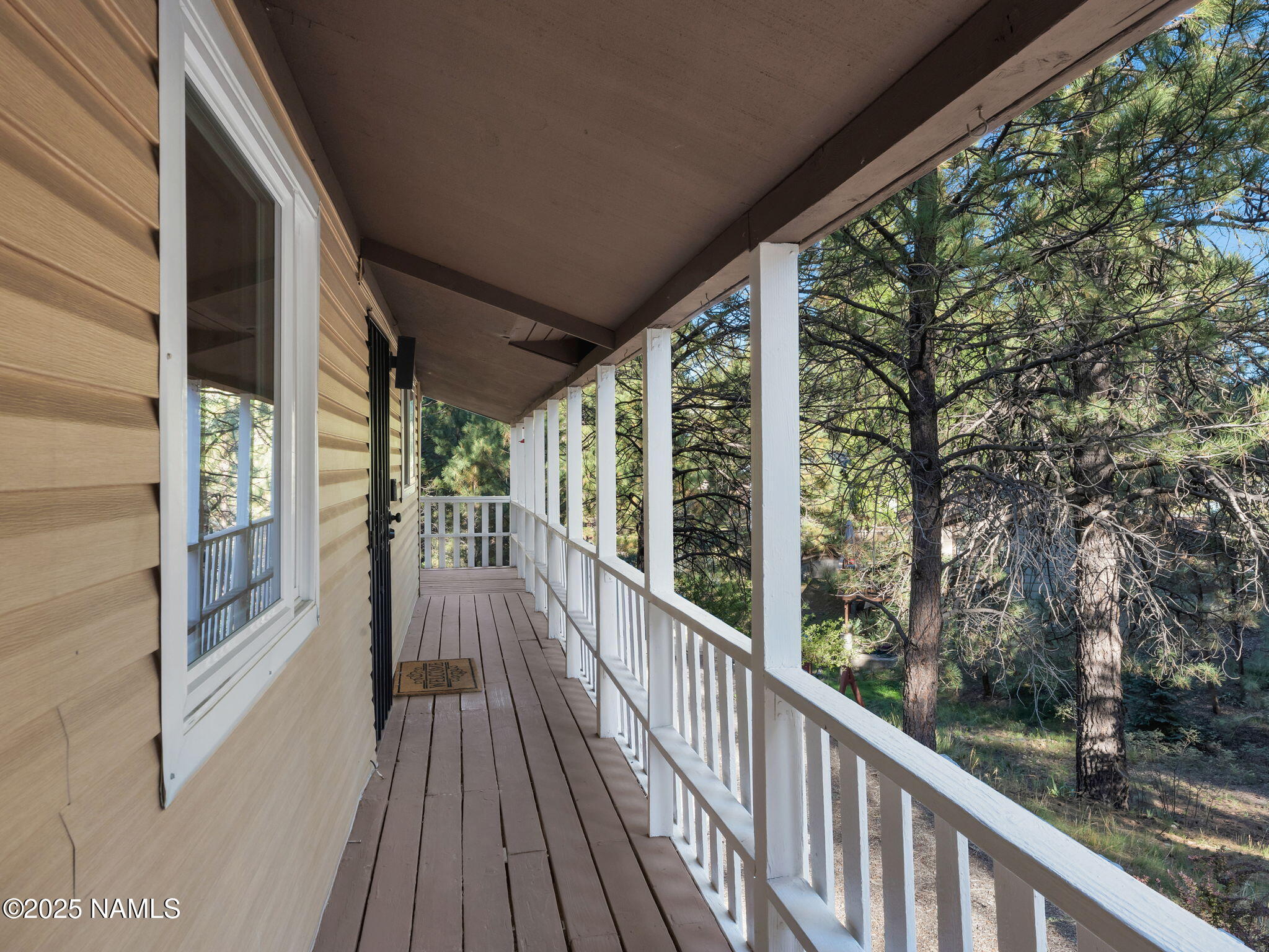 4449 Canyon Loop Flagstaff, AZ 86005 - Photo 19 of 37 a view of balcony with wooden floor
