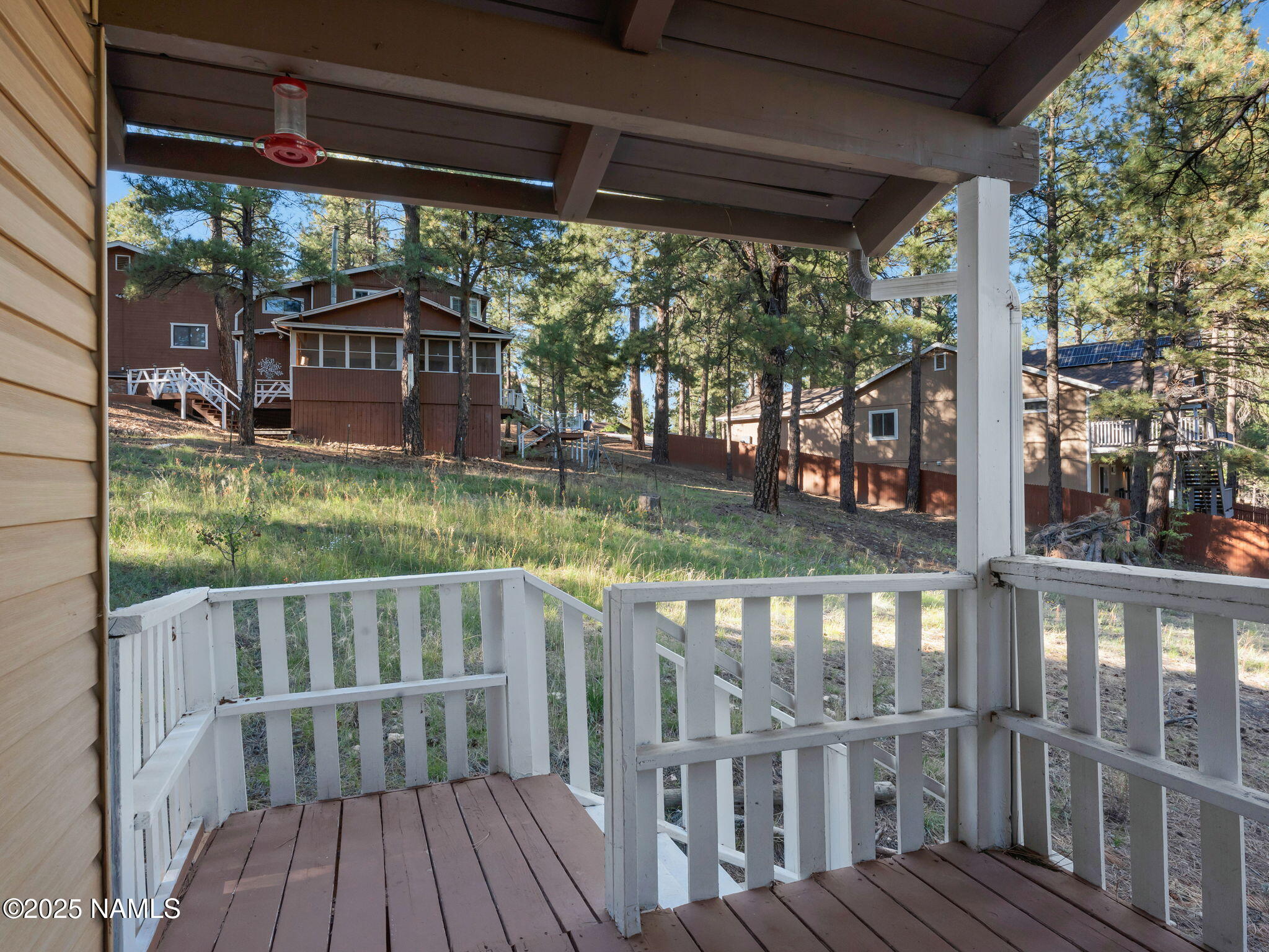 4449 Canyon Loop Flagstaff, AZ 86005 - Photo 22 of 37 a view of porch with wooden floor