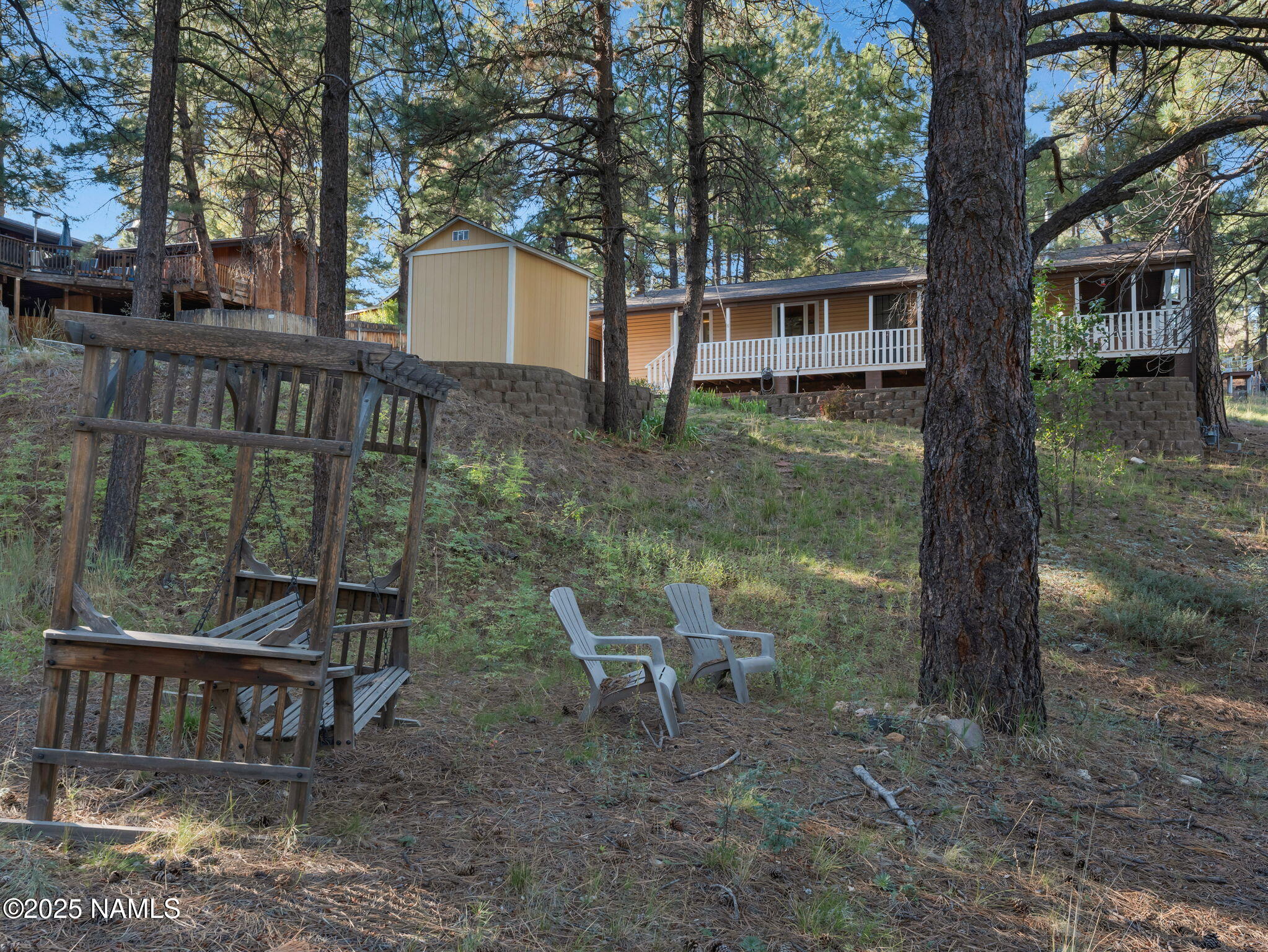 4449 Canyon Loop Flagstaff, AZ 86005 - Photo 25 of 37 a house view with a outdoor seating space