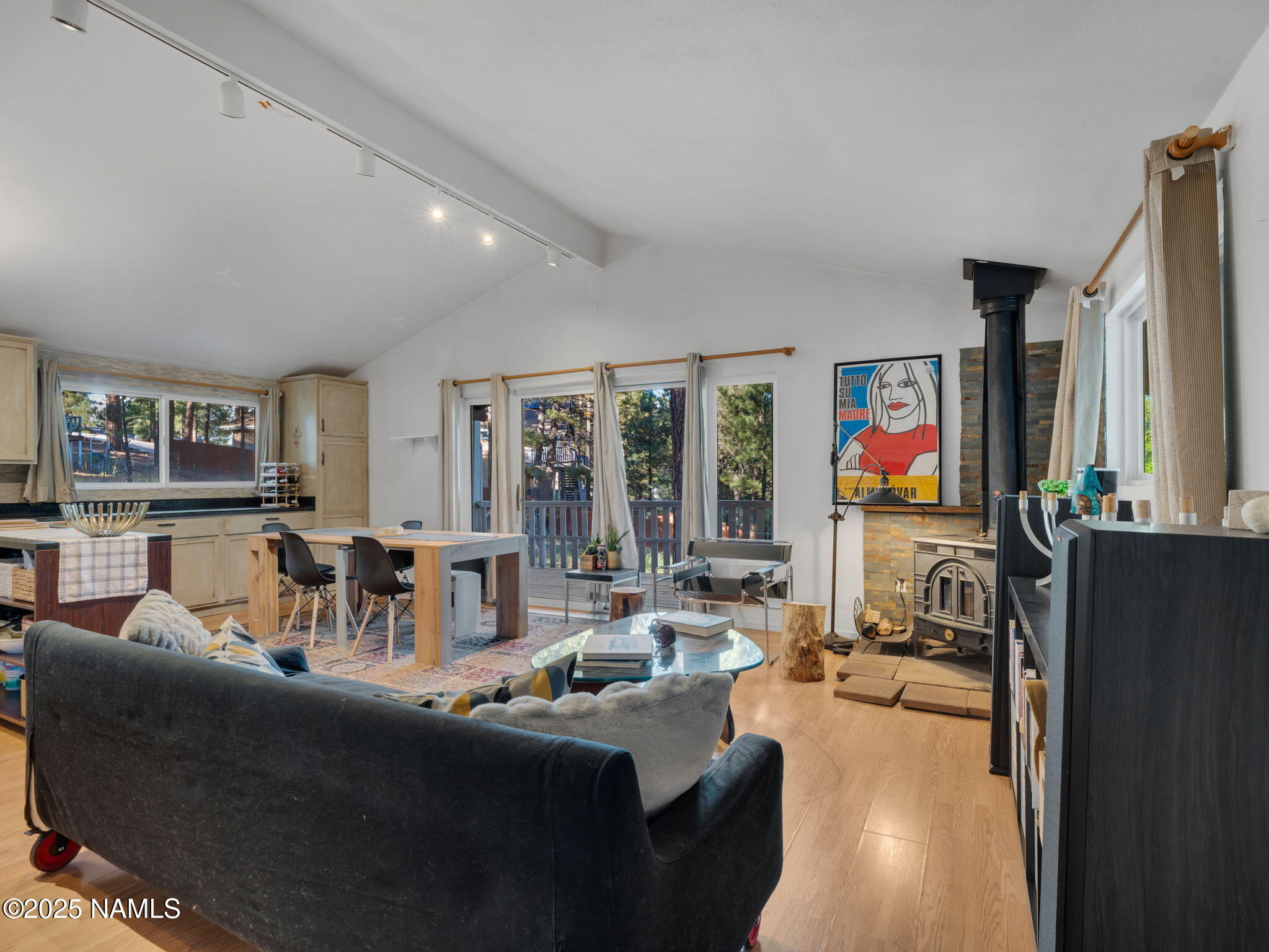 4449 Canyon Loop Flagstaff, AZ 86005 - Photo 4 of 37 a living room with fireplace furniture and a flat screen tv