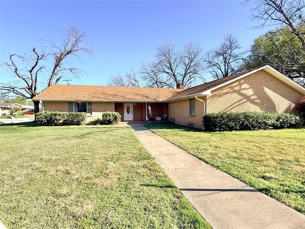 429 Agnes Avenue Marlin, TX 76661 - Photo 2 of 28 a view of a white house with a yard