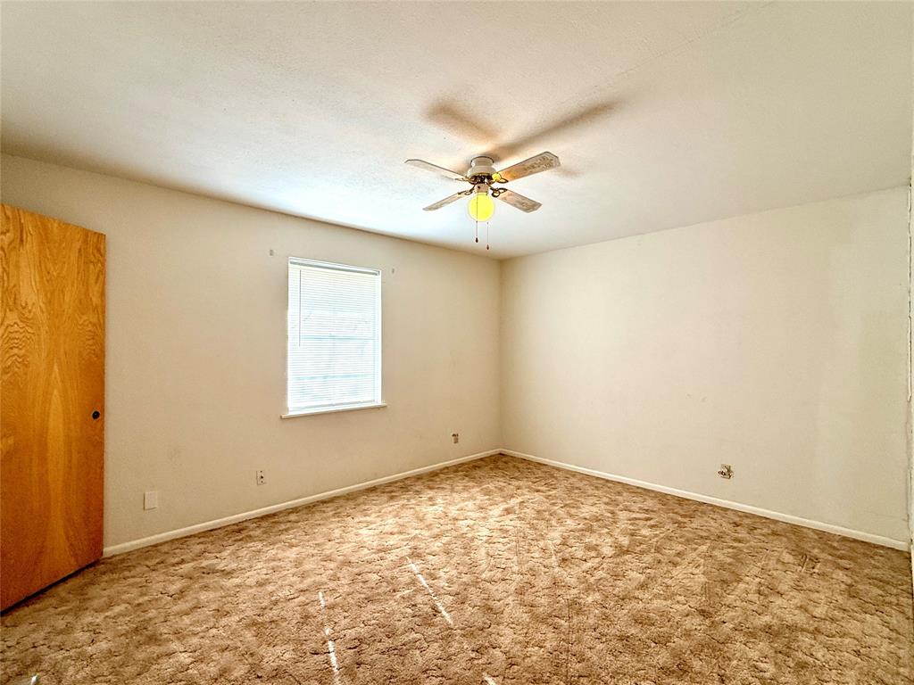 429 Agnes Avenue Marlin, TX 76661 - Photo 22 of 28 a view of an empty room with a window