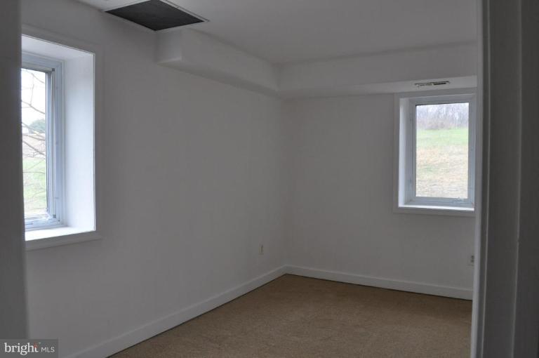 5300 Wertz Road Hampstead, MD 21074 - Photo 19 of 25 an empty room with a window