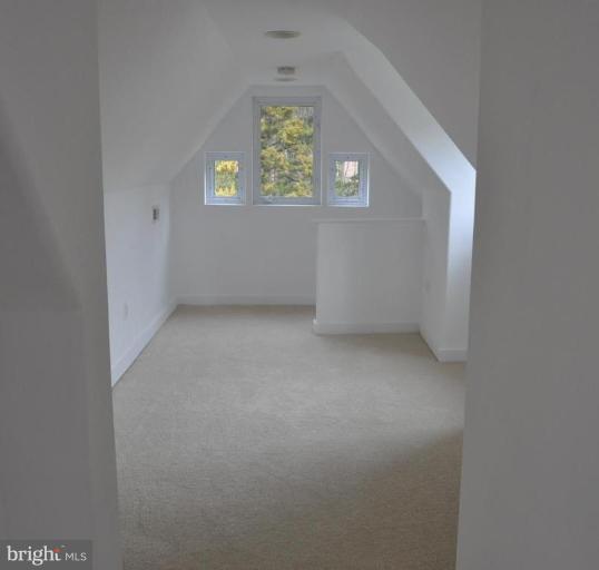 5300 Wertz Road Hampstead, MD 21074 - Photo 22 of 25 an empty room with windows and mirror