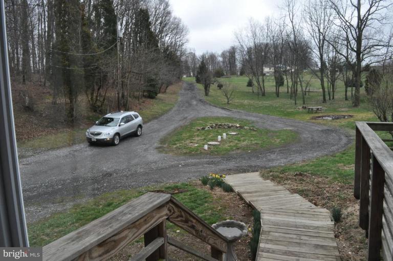 5300 Wertz Road Hampstead, MD 21074 - Photo 24 of 25 a view of a backyard with wooden fence