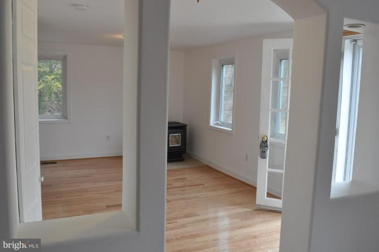 5300 Wertz Road Hampstead, MD 21074 - Photo 6 of 25 an empty room with windows and closet