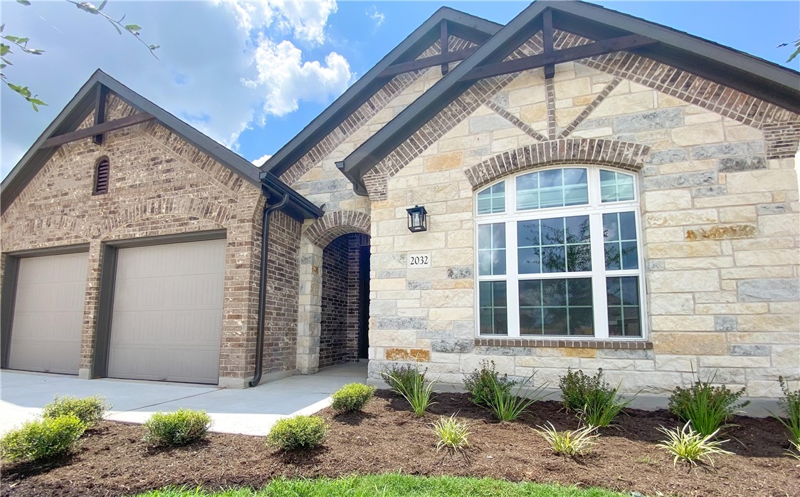2032 Base Burner Path Leander, TX 78641 - Photo 1 of 1 a front view of a house