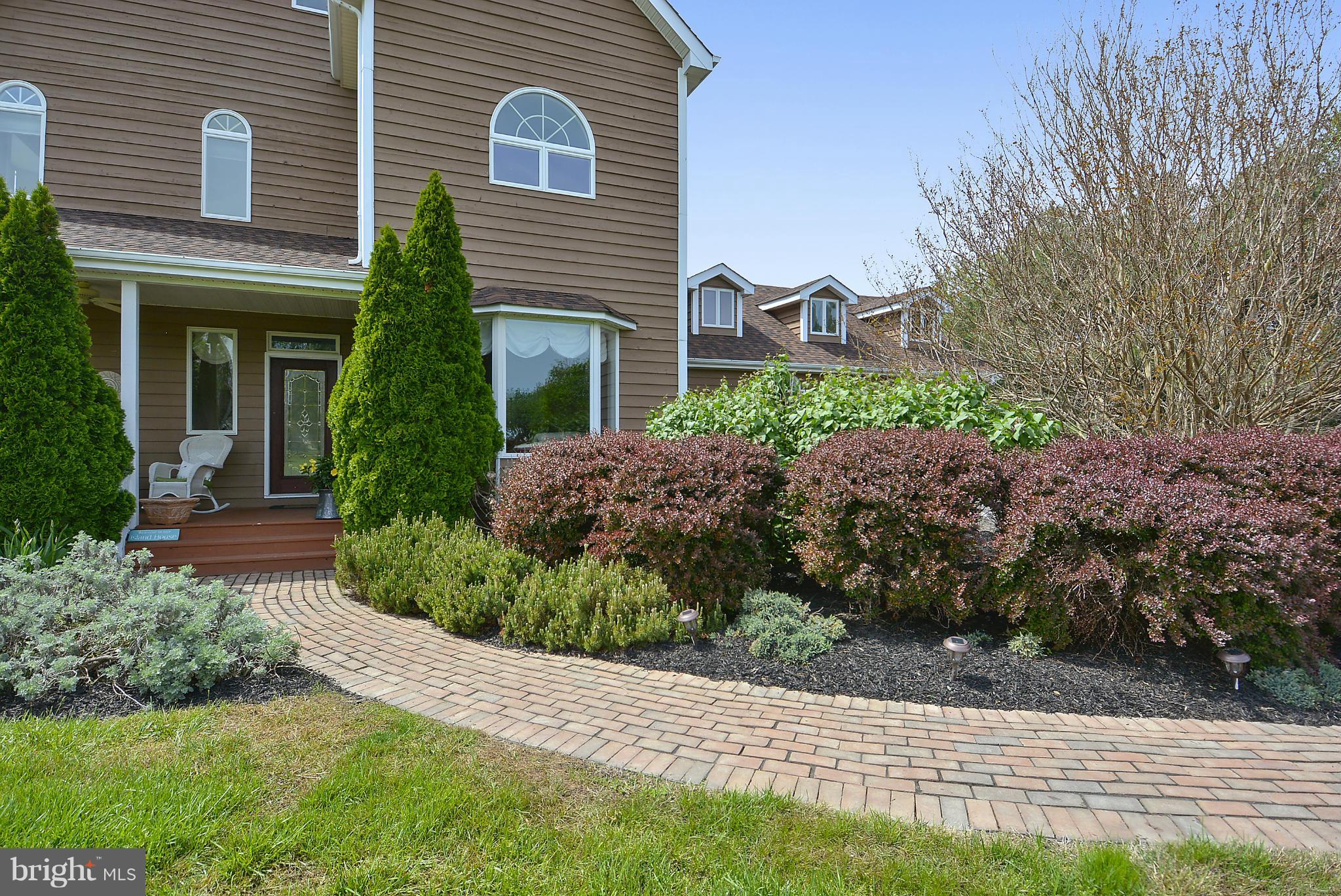 2818 Cox Neck Road Chester, MD 21619 - Photo 9 of 30 Professional Hardscaping and Lush Landscaping