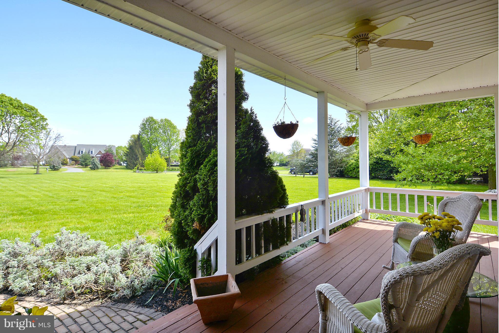 2818 Cox Neck Road Chester, MD 21619 - Photo 10 of 30 Beckoning Plantation Porch Surveying Peaceful Yard