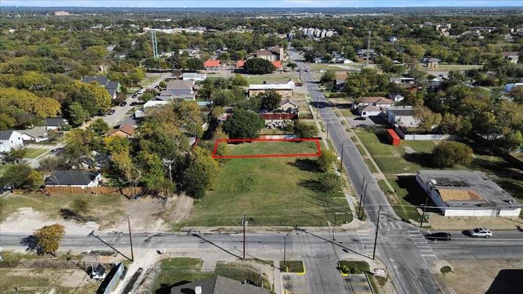 1315 Morrell Avenue Dallas, TX 75203 - Photo 5 of 8 an aerial view of residential houses with outdoor space