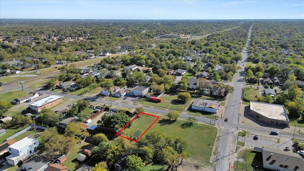 1315 Morrell Avenue Dallas, TX 75203 - Photo 6 of 8 an aerial view of residential houses with outdoor space