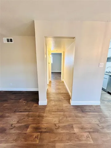 a bathroom with a sink a toilet and a shower