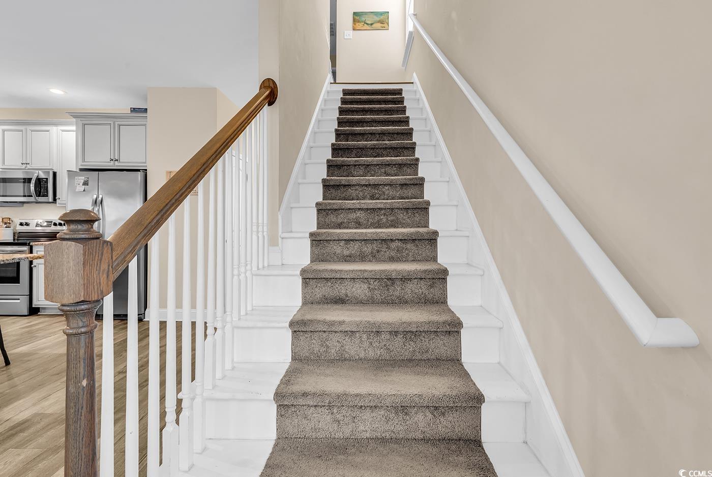 117 B 16th Avenue South Surfside Beach, SC 29575 - Photo 12 of 40 Stairs featuring wood finished floors and recessed lighting