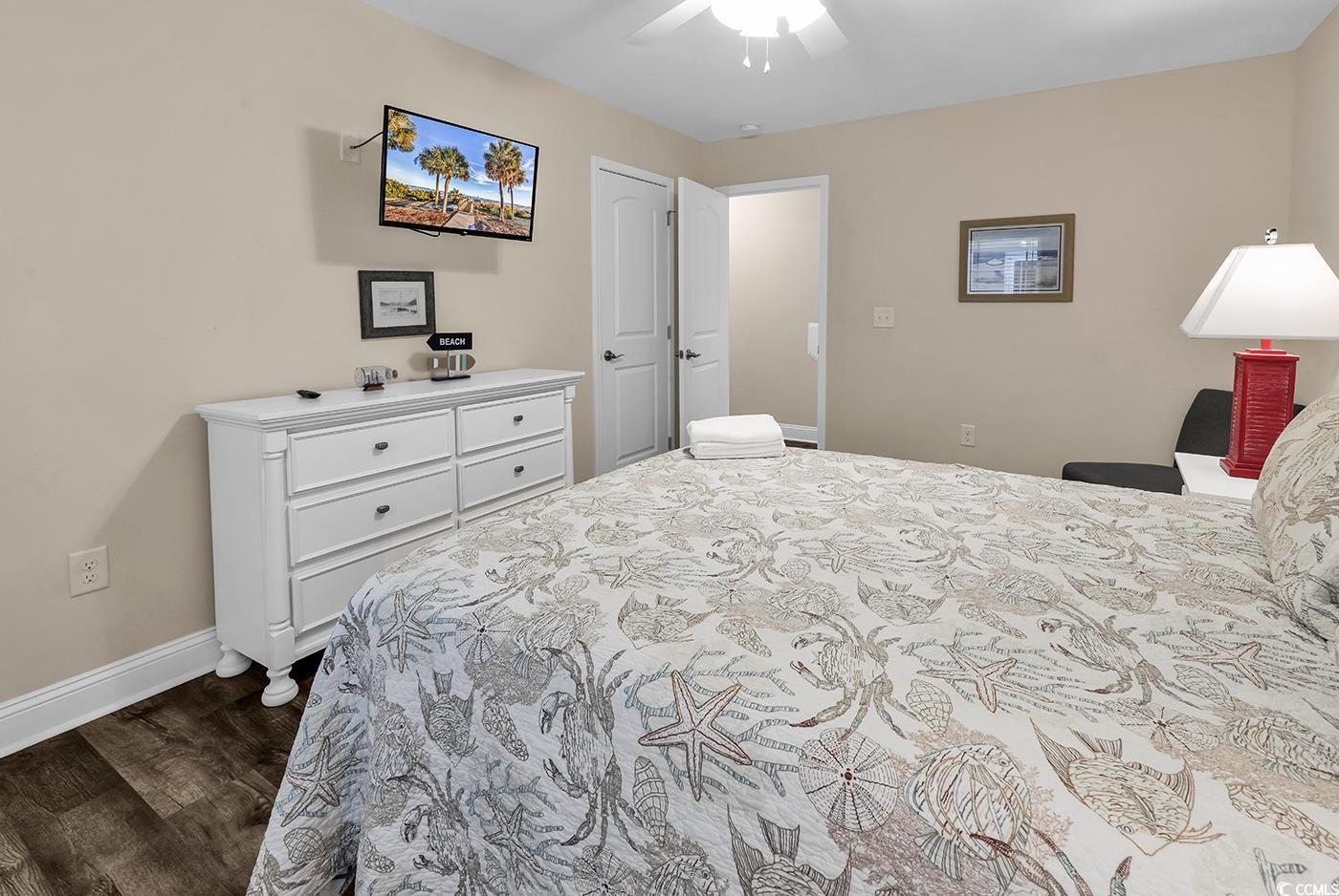 117 B 16th Avenue South Surfside Beach, SC 29575 - Photo 21 of 40 Bedroom featuring dark wood-style floors and ceiling fan
