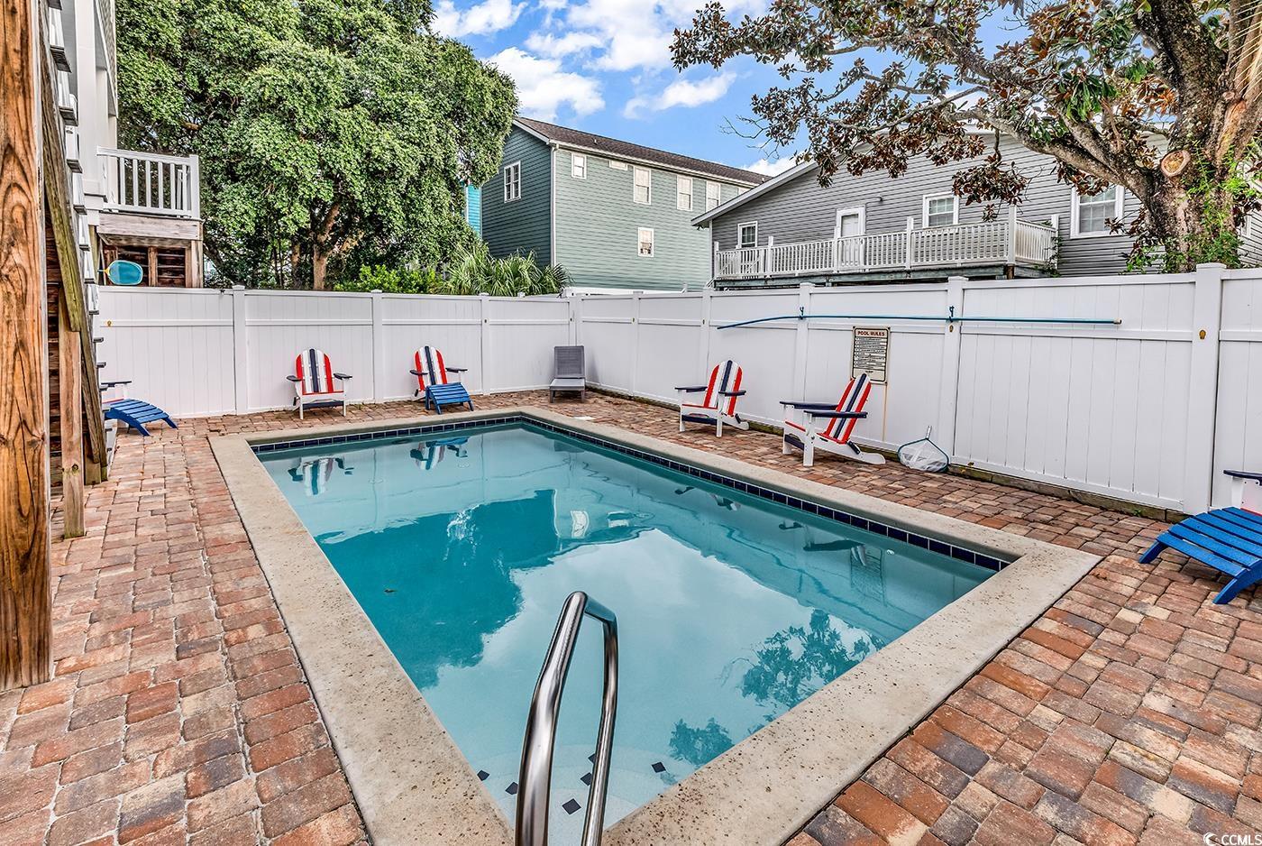 117 B 16th Avenue South Surfside Beach, SC 29575 - Photo 38 of 40 View of pool with a fenced backyard and a patio area