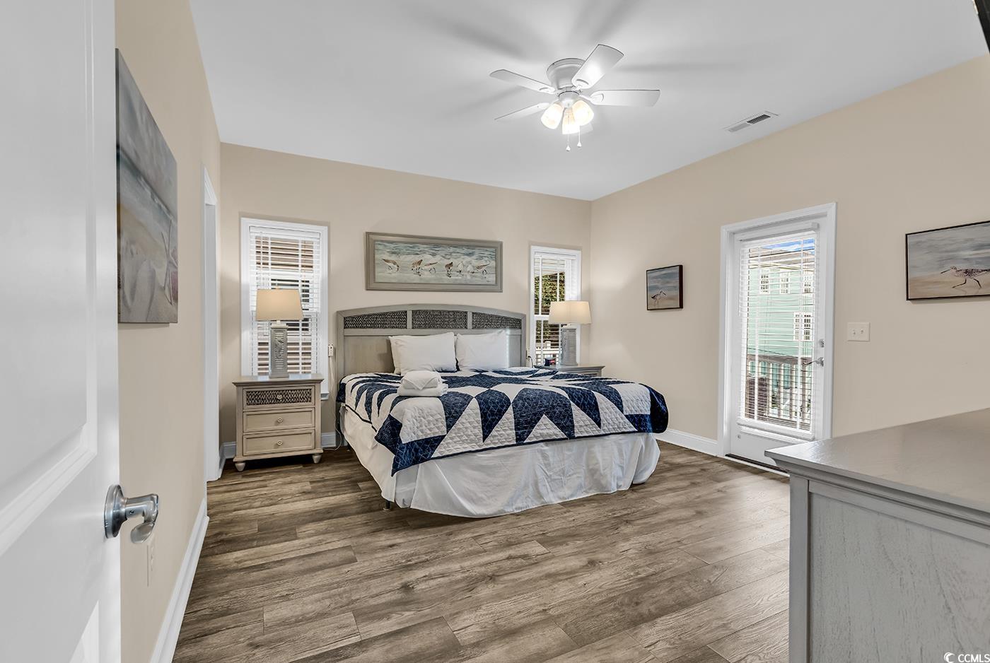 117 B 16th Avenue South Surfside Beach, SC 29575 - Photo 8 of 40 Bedroom featuring dark wood-style flooring, access to outside, and ceiling fan