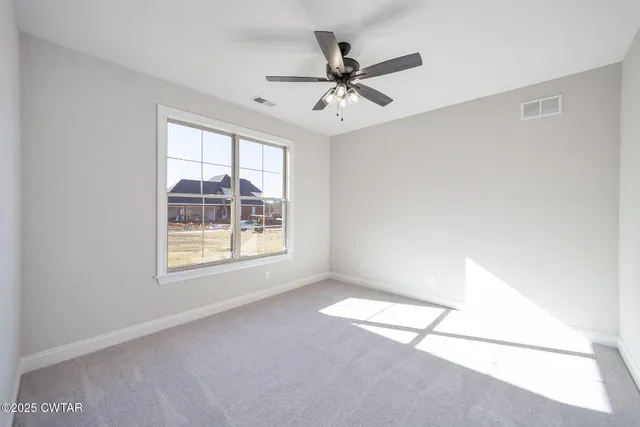 a view of a yard with an outdoor space