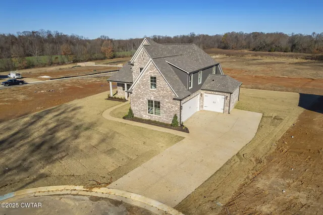 a view of kitchen with wooden floor and window