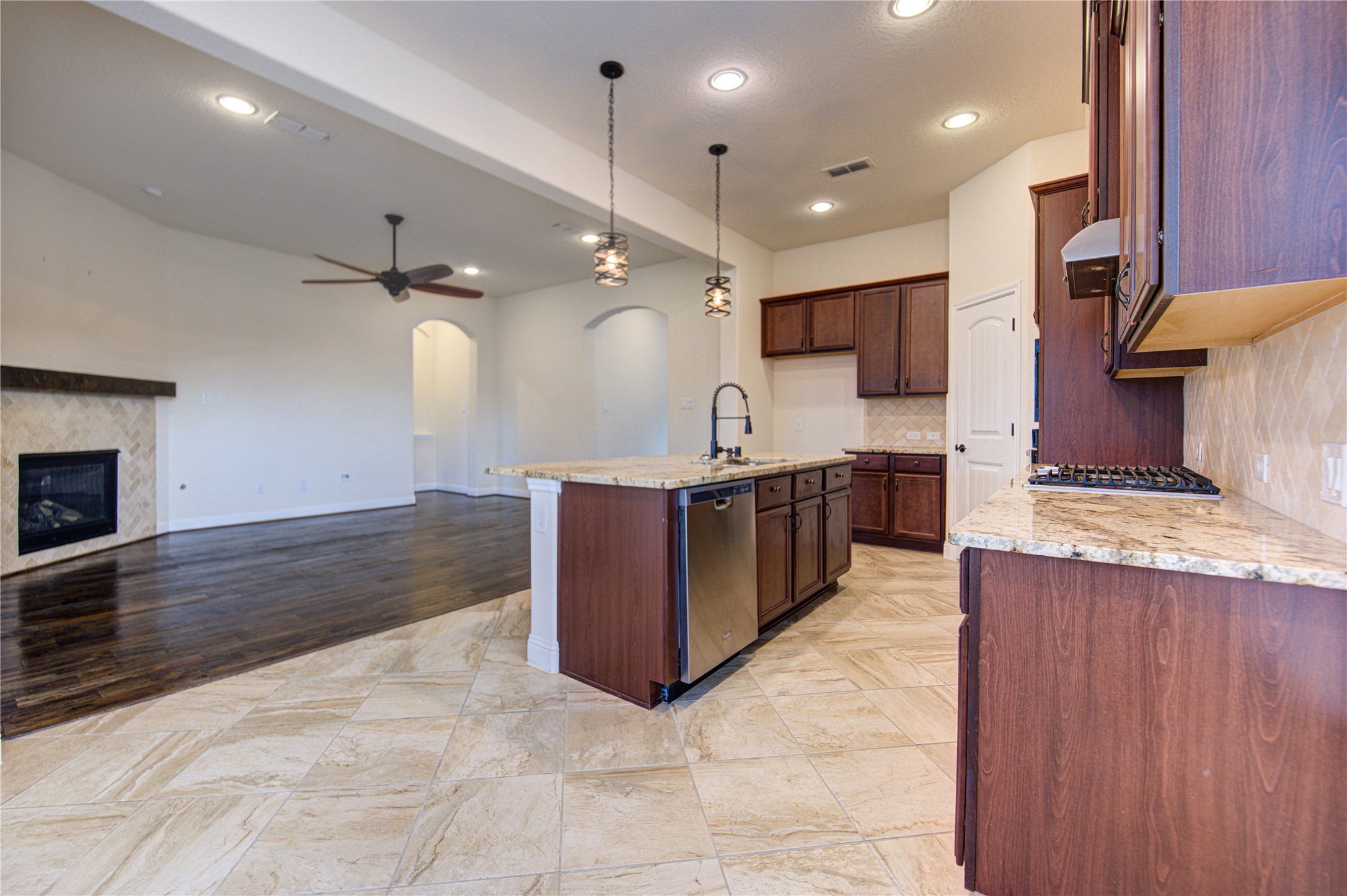 6622 Tiger Trail Katy, TX 77493 - Photo 22 of 49 a large kitchen with stainless steel appliances a large counter top