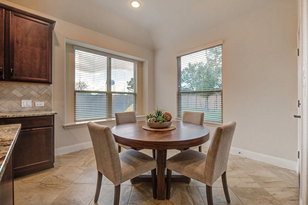 6622 Tiger Trail Katy, TX 77493 - Photo 25 of 49 a view of a dining room with furniture window and outside view