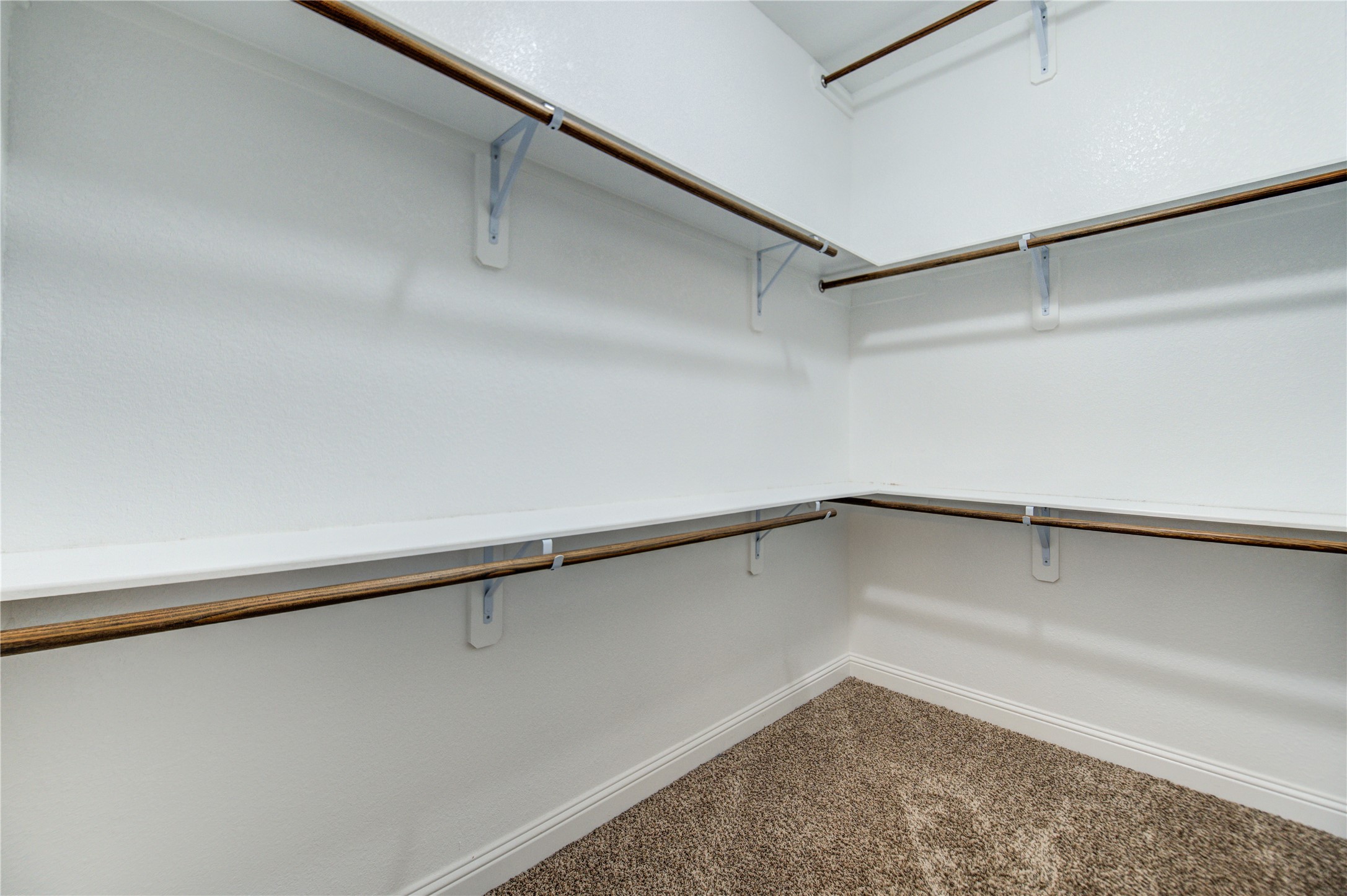 6622 Tiger Trail Katy, TX 77493 - Photo 33 of 49 a view of a room with racks on the wall