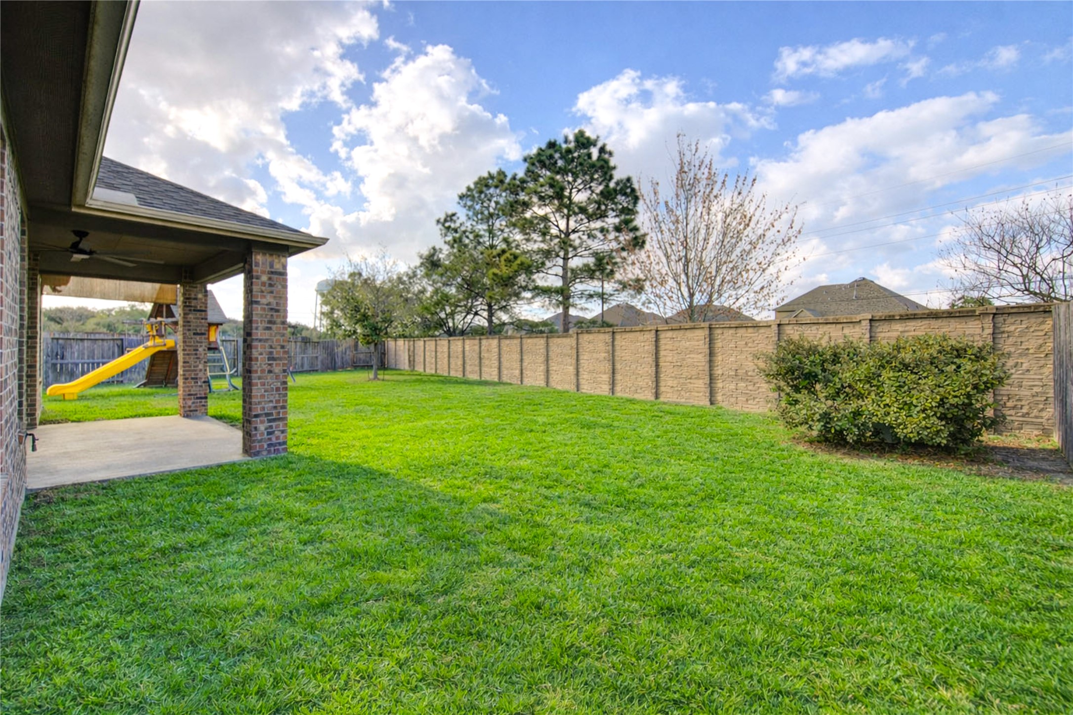 6622 Tiger Trail Katy, TX 77493 - Photo 48 of 49 a view of a backyard with a garden and entertaining space