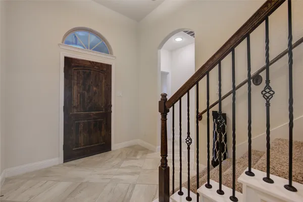 a view of an entryway with staircase