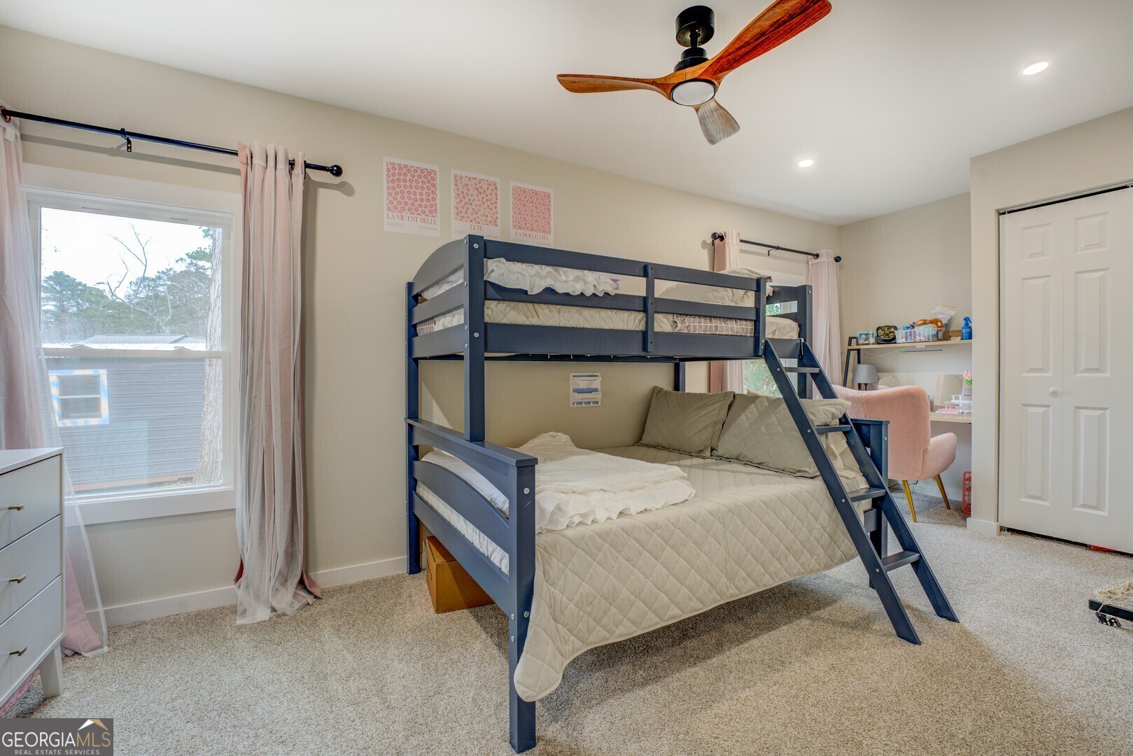 480 Mitchell Road Covington, GA 30014 - Photo 18 of 56 a bedroom with a bed and a window