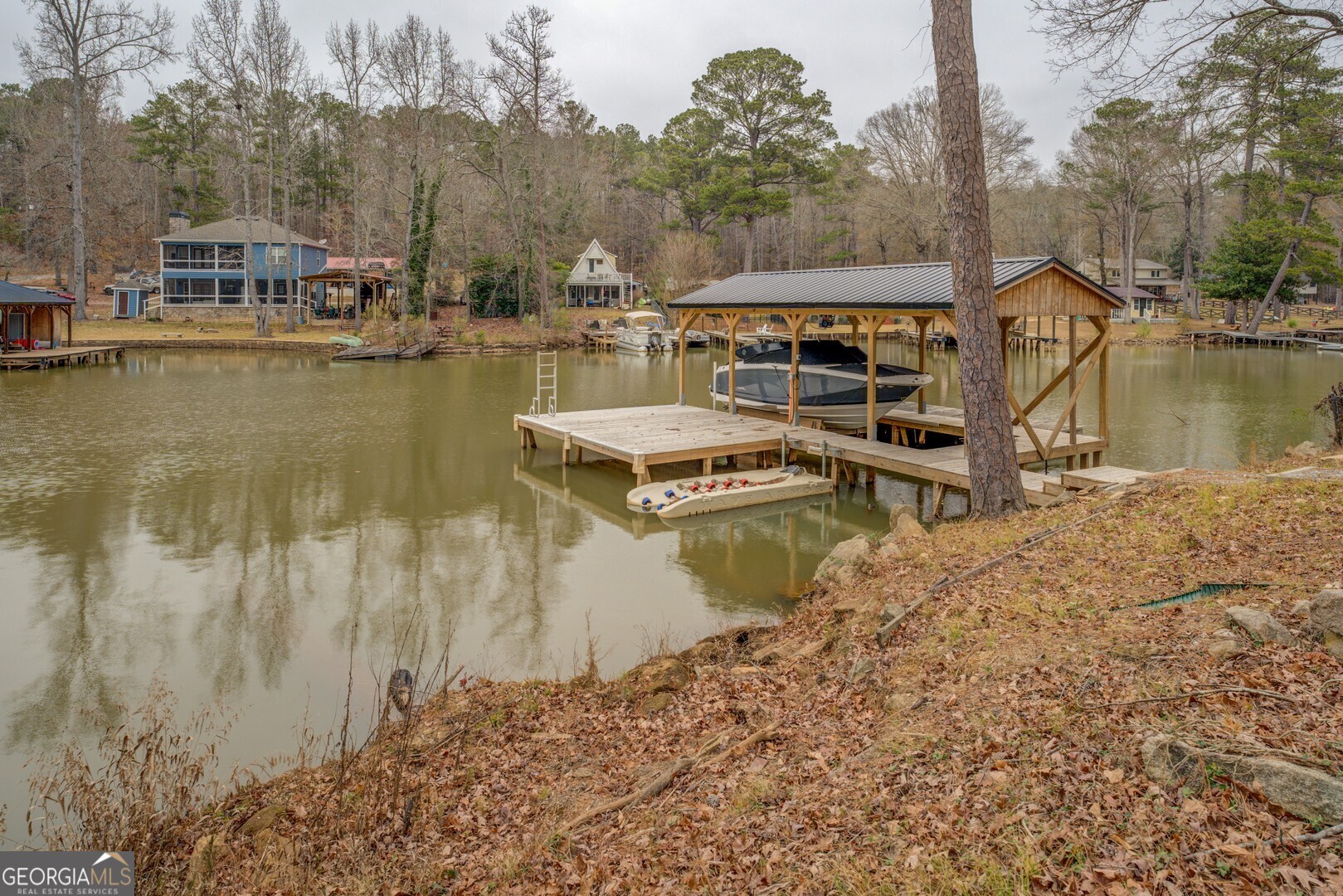 480 Mitchell Road Covington, GA 30014 - Photo 43 of 56 a view of a lake with houses