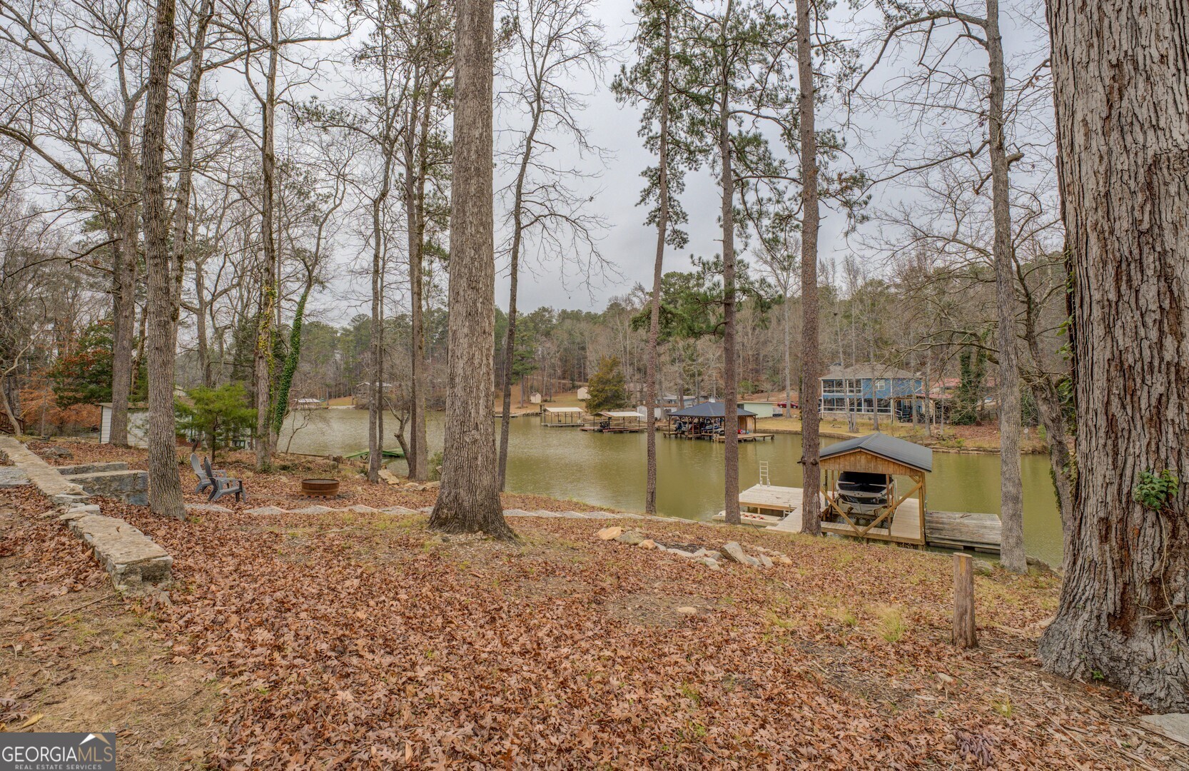 480 Mitchell Road Covington, GA 30014 - Photo 52 of 56 a lake view with large trees