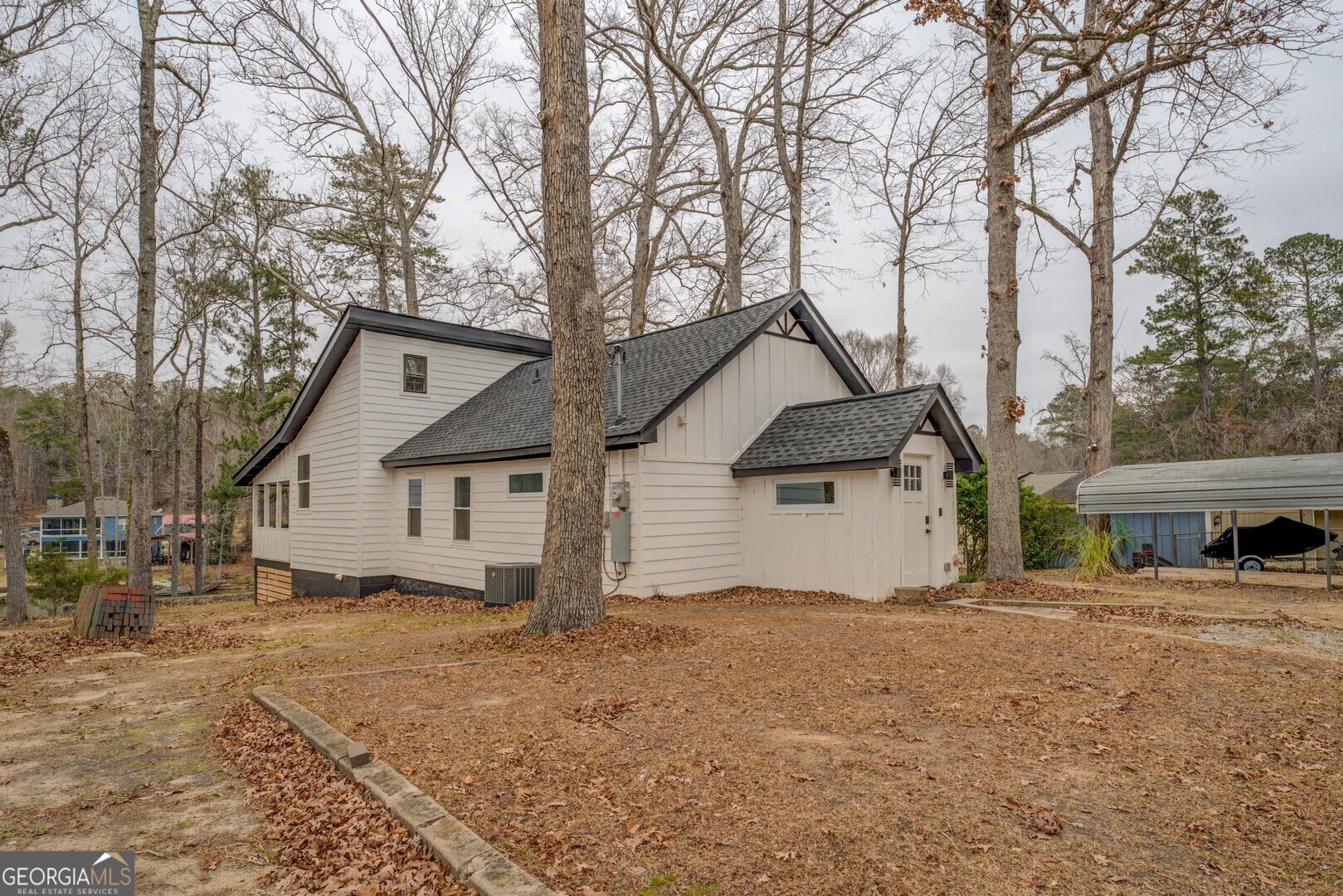 480 Mitchell Road Covington, GA 30014 - Photo 54 of 56 a view of a house with a yard covered in snow