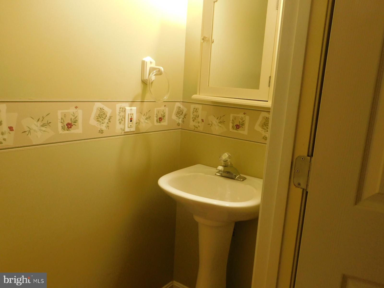 5 Keppels Mill Court Rising Sun, MD 21911 - Photo 9 of 49 Charming half-bath with floral accents.